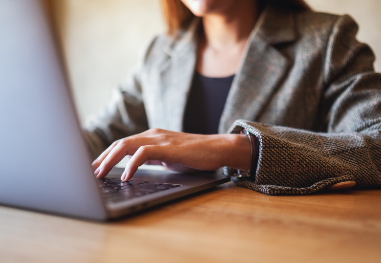 closeup-image-of-a-businesswoman-working-and-typin